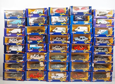 Lot 382 - A group of CORGI diecast cars and vans in blue...