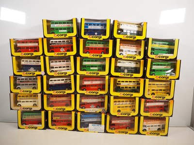 Lot 399 - A group of CORGI diecast buses all in...