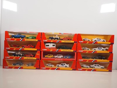Lot 404 - A group of CORGI triple and twin vehicle boxed...