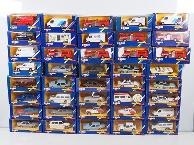 Lot 445 - A group of CORGI diecast cars and vans in blue...