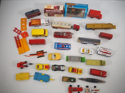 Lot 495 - A tray of mostly unboxed diecast vehicles by...