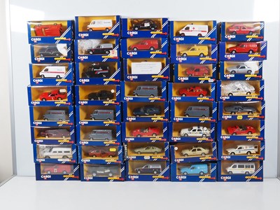 Lot 506 - A group of CORGI diecast cars and vans in blue...