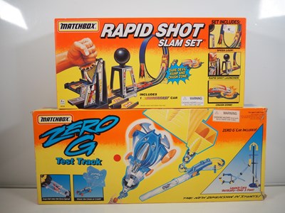 Lot 539 - A pair of MATCHBOX track racing sets...