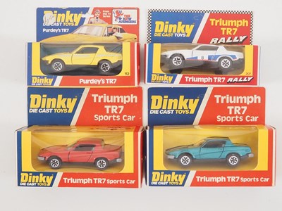 Lot 587 - A group of DINKY diecast Triumph TR7s in later...
