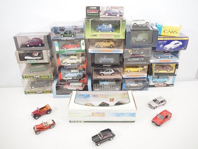 Lot 606 - A large quantity of boxed diecast cars by...