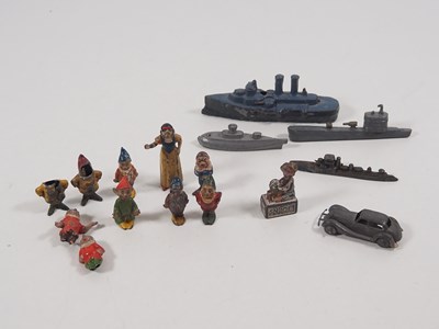 Lot 618 - A group of pre-war diecast / lead figures and...
