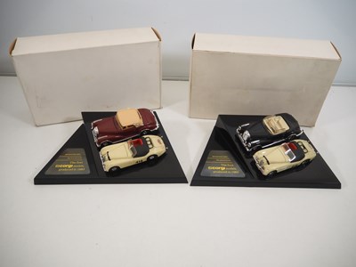 Lot 631 - A pair of CORGI promotional issue display...
