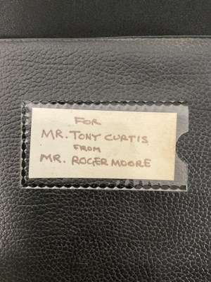 Lot 259 - A handmade scrapbook by ROGER MOORE for TONY...