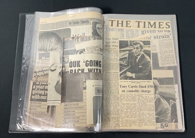 Lot 259 - A handmade scrapbook by ROGER MOORE for TONY...