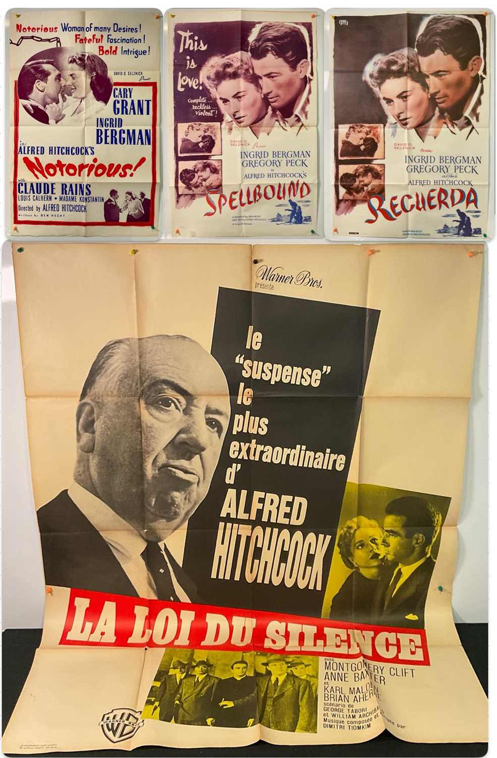 Lot 221 - A group of movie posters for Alfred Hitcock...