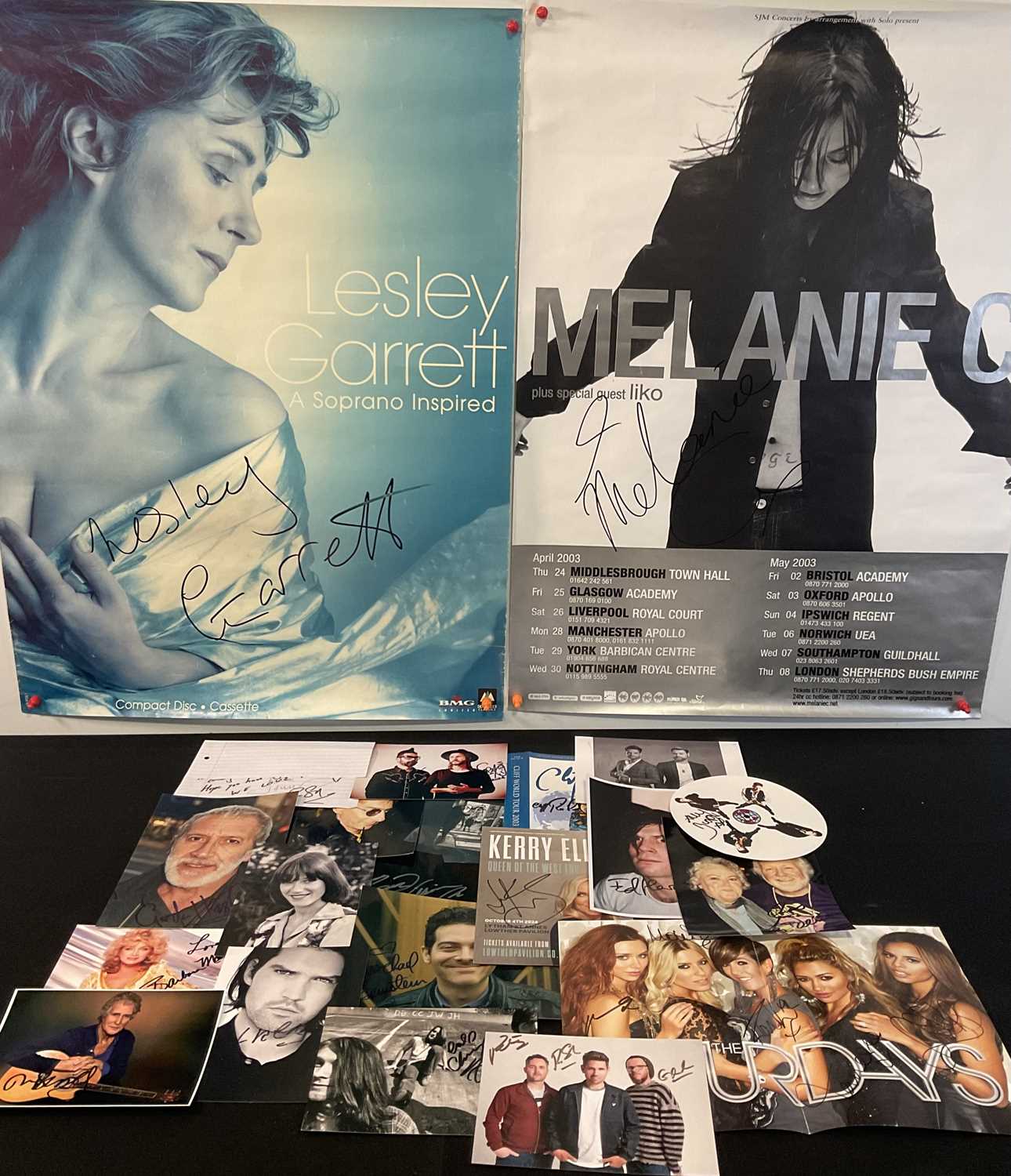 Lot 541 - A band of signed music photographs and posters...