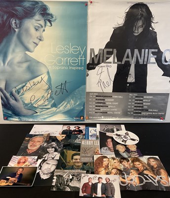 Lot 541 - A band of signed music photographs and posters...