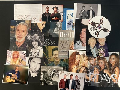 Lot 541 - A band of signed music photographs and posters...