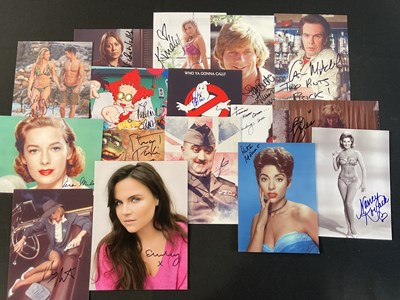 Lot 513 - A cast of signed photographs from a variety of...
