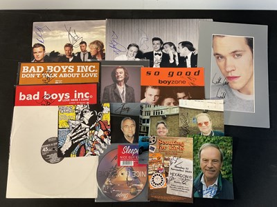 Lot 516 - A concert of signed photographs and posters...