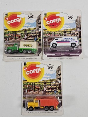 Lot 220 - Mid 1980's CORGI Juniors on picture cards (3) -...