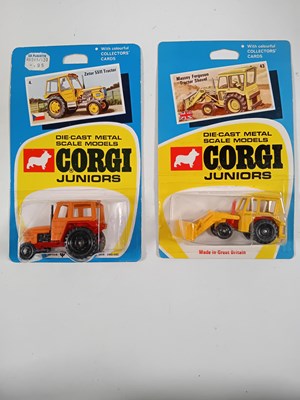 Lot 300 - A pair of CORGI Juniors on original Regular...