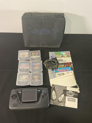 Lot 643 - A SEGA GAME GEAR, with 6 games comprising...