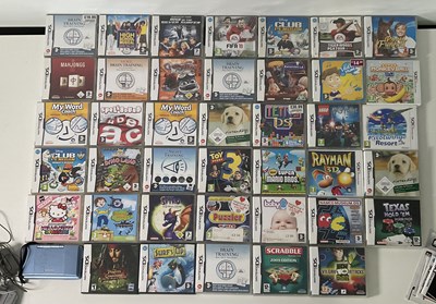 Lot 645 - An unboxed NINTENDO DS game console with power...