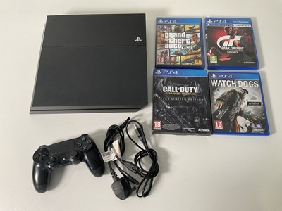 Lot 657 - A SONY PLAYSTATION 4 with controller, charger...