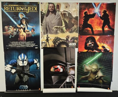 Lot 776 - A group of STAR WARS video posters and other...