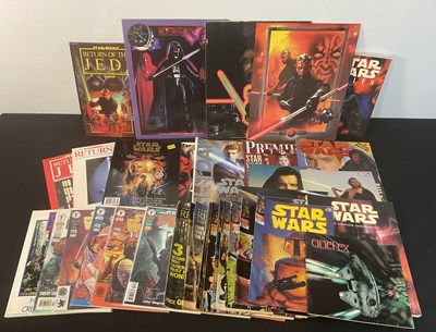 Lot 733 - A selection of STAR WARS comics and magazines,...