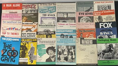 Lot 438 - A chorus of sheet music for TV show theme...