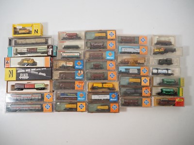 Lot 7 - A group of N gauge European outline wagons by...