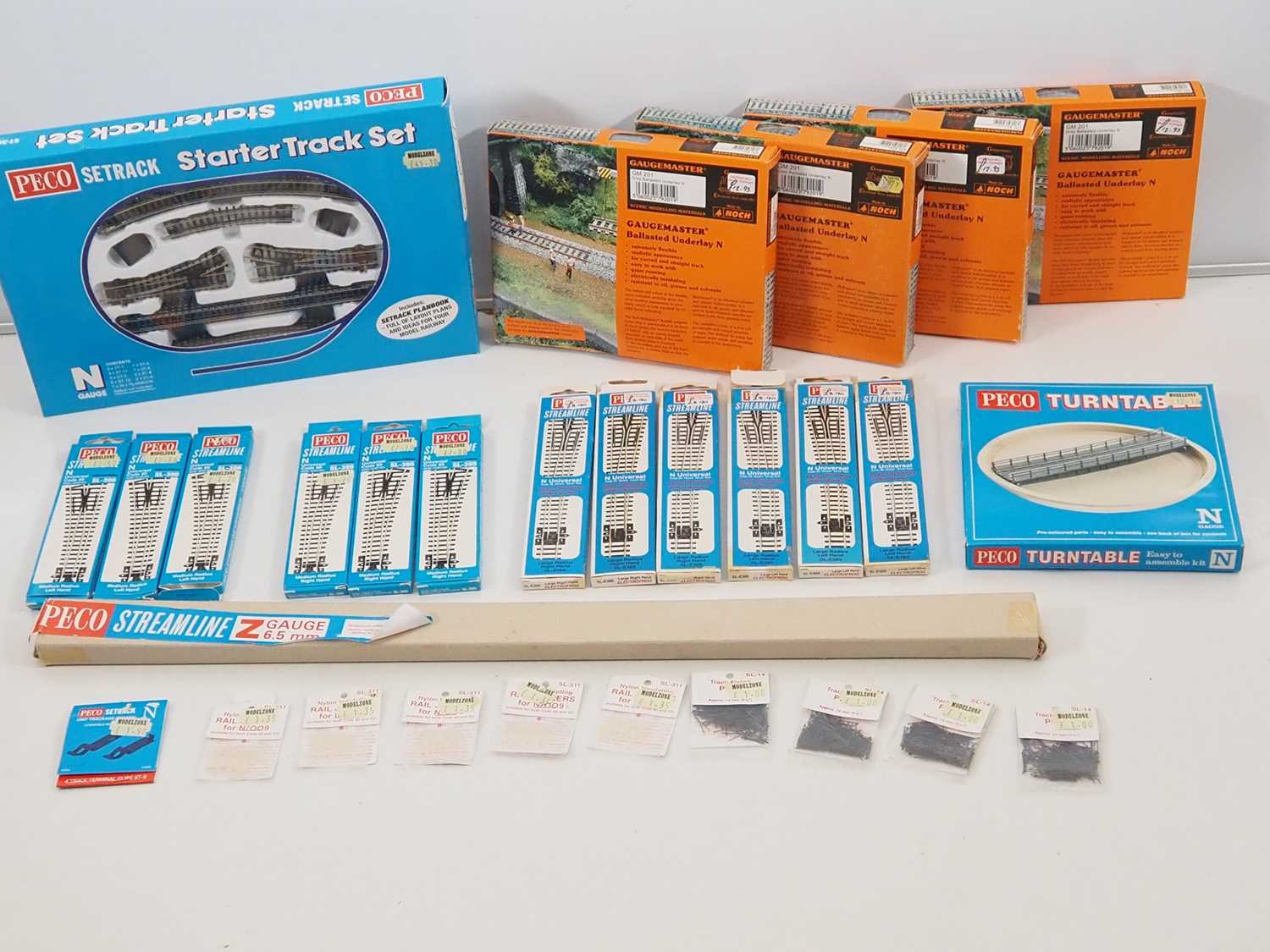 Lot 9 - A group of N gauge track and accessories by...