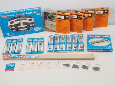 Lot 9 - A group of N gauge track and accessories by...