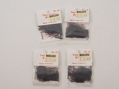Lot 9 - A group of N gauge track and accessories by...