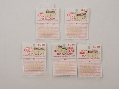 Lot 9 - A group of N gauge track and accessories by...