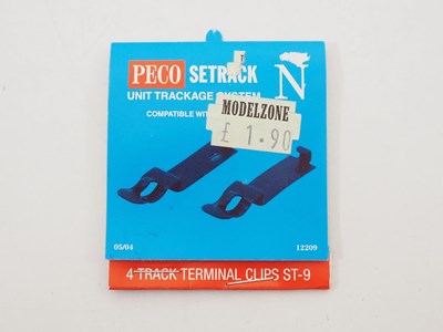 Lot 9 - A group of N gauge track and accessories by...