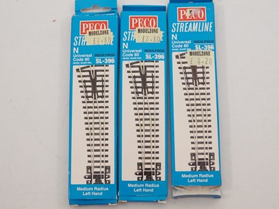 Lot 9 - A group of N gauge track and accessories by...