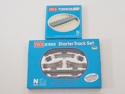 Lot 9 - A group of N gauge track and accessories by...