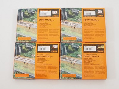 Lot 9 - A group of N gauge track and accessories by...