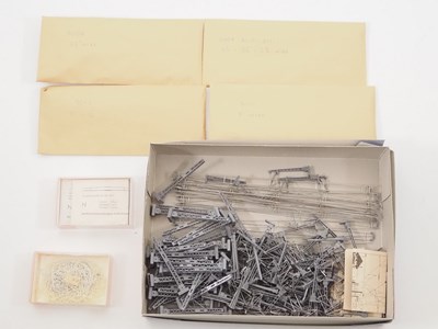 Lot 27 - A large quantity of N gauge catenary masts,...