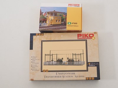 Lot 45 - A landscape of N gauge building kits by FALLER...