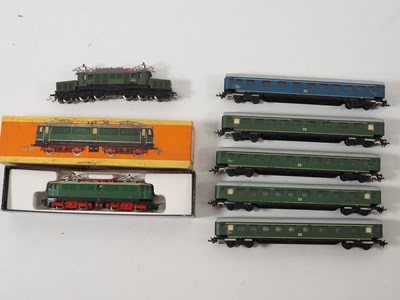 Lot 64 - A group of TT gauge German outline electric...