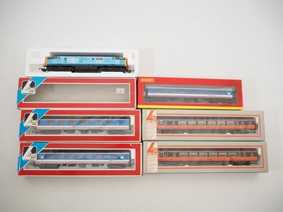 Lot 98 - A group of OO gauge rolling stock by LIMA and...
