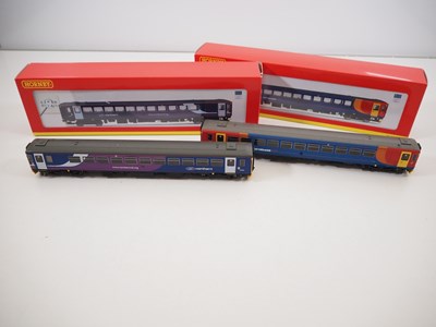 Lot 321 - A pair of HORNBY OO gauge class 153 diesel...