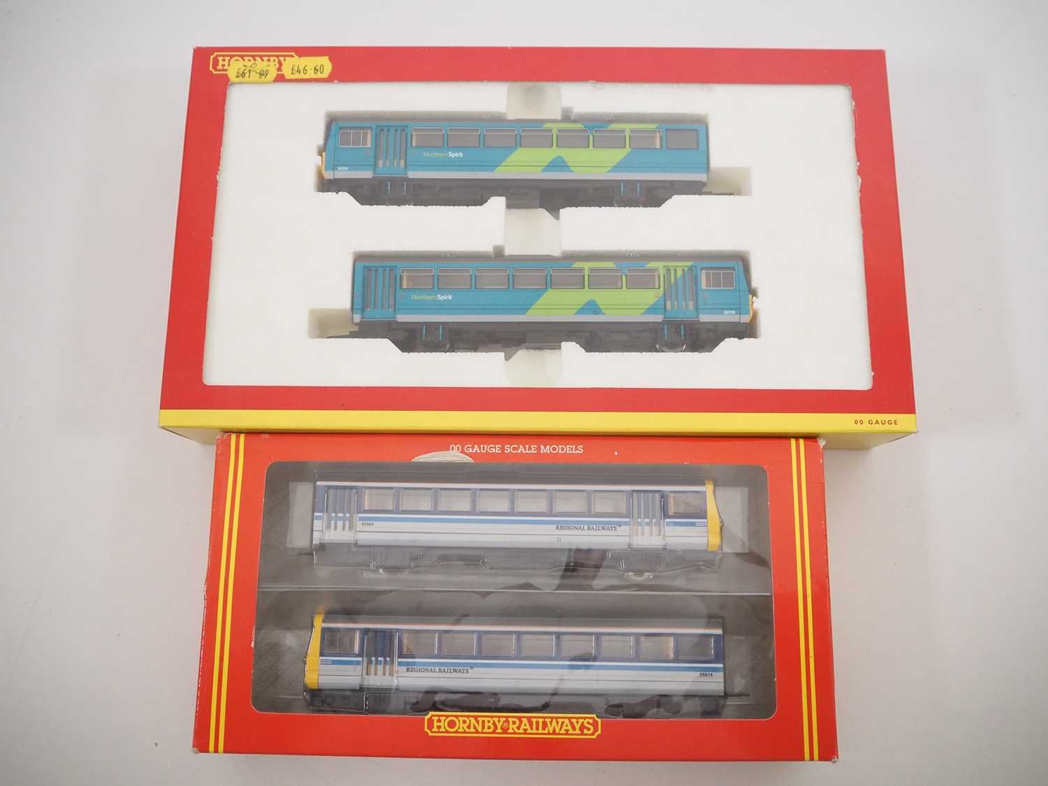 Lot 326 - A pair of HORNBY OO gauge class 142 Pacer DMUs...