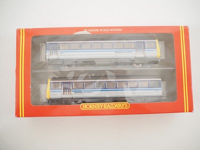 Lot 326 - A pair of HORNBY OO gauge class 142 Pacer DMUs...
