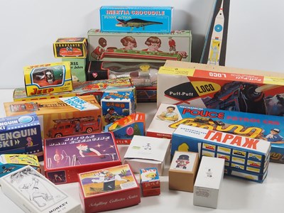 Lot 492 - A group of tinplate toys, mostly Chinese and...