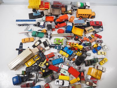 Lot 553 - A group of mixed unboxed diecast toys by...
