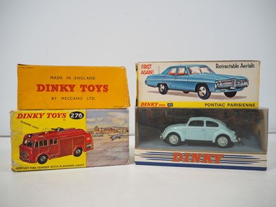 Lot 561 - A pair of DINKY boxed diecast vehicles...