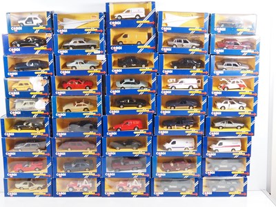 Lot 606 - CORGI - Diecast cars and vans in blue window...