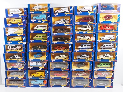Lot 607 - CORGI - Diecast cars and vans in blue window...