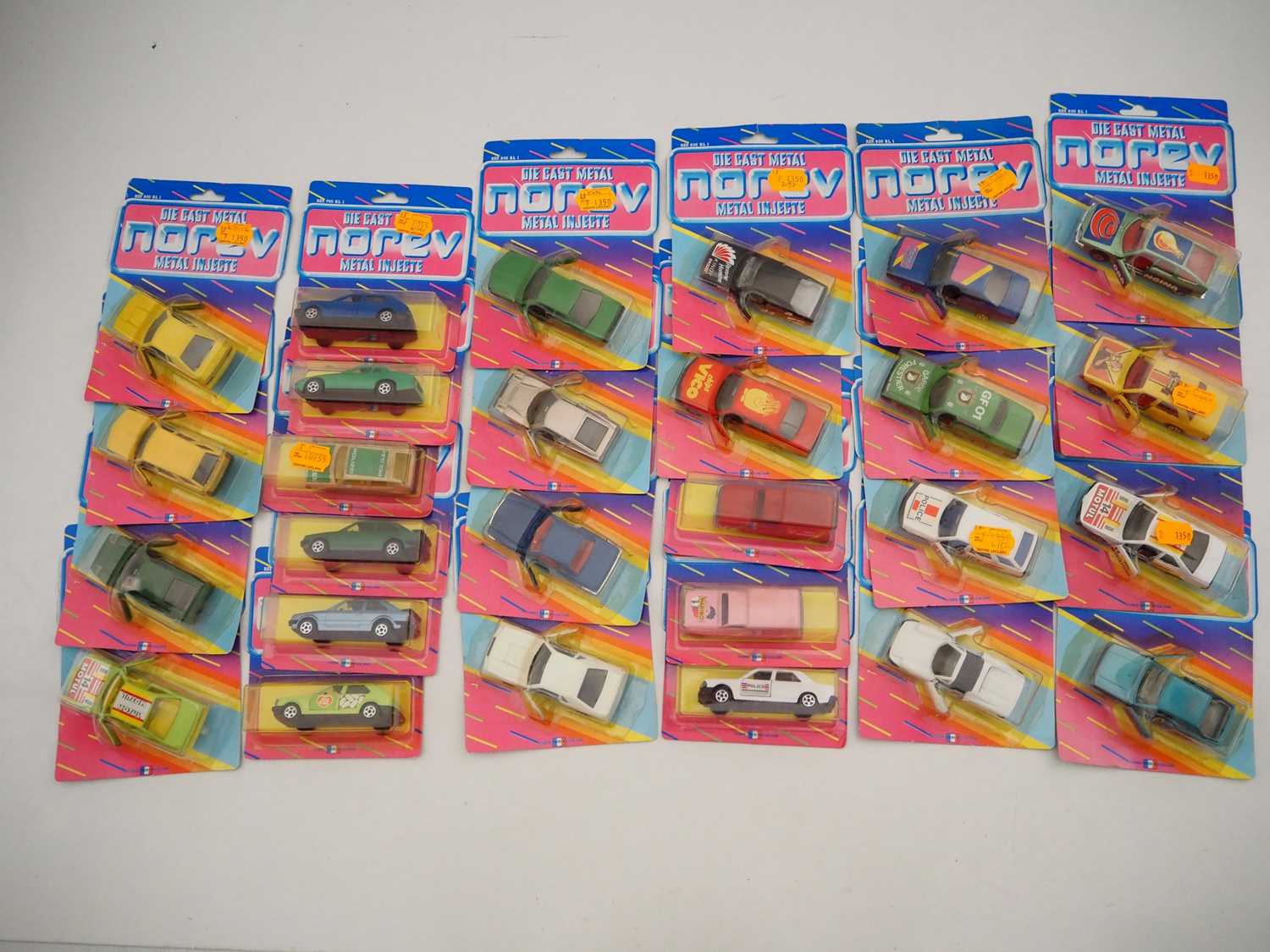 Lot 681 - A group of NOREV diecast cars on original...