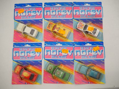 Lot 681 - A group of NOREV diecast cars on original...